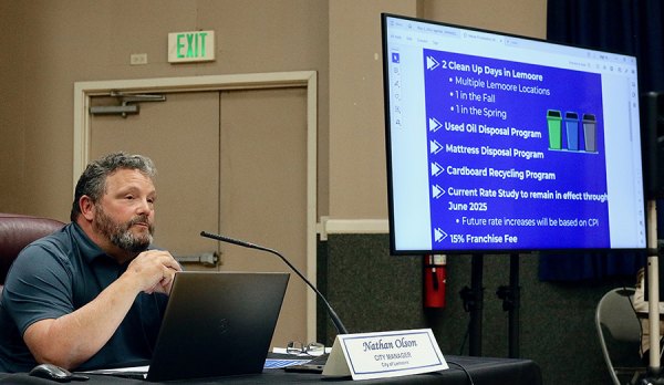 Lemoore City Manager Nathan Olson helps to lead a discussion regarding possible privatization of the city's refuse department.